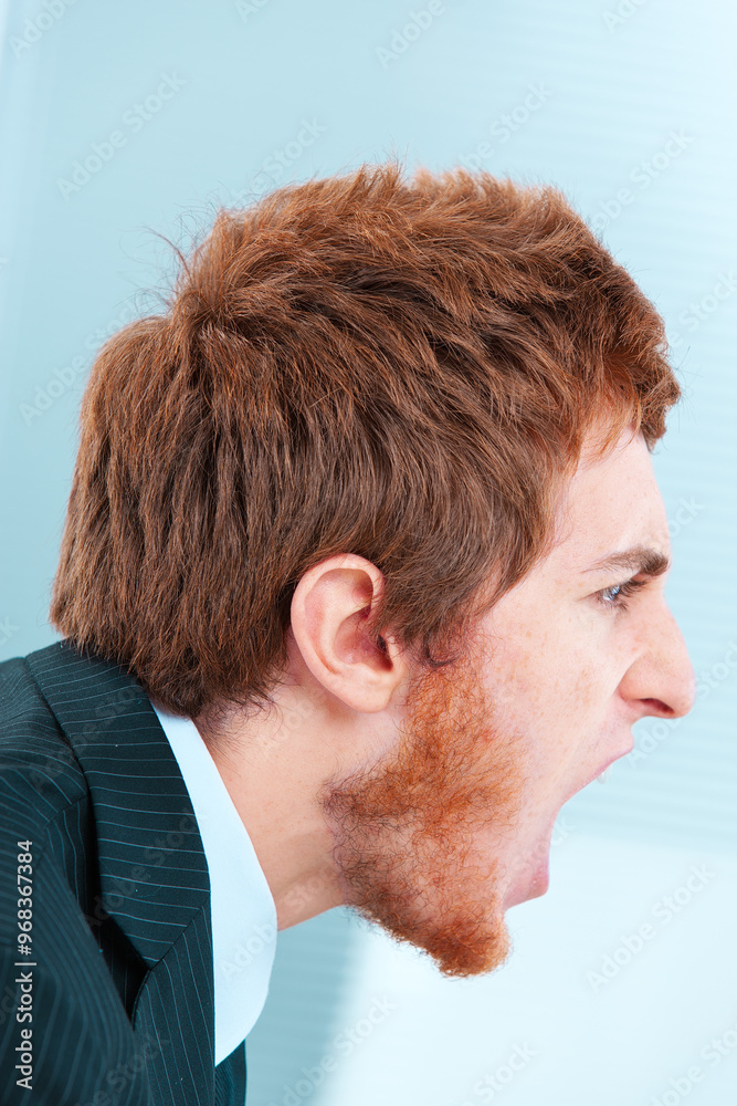 Businessman screaming side view profile office space for copy Businessman screaming side view profile office space for copy