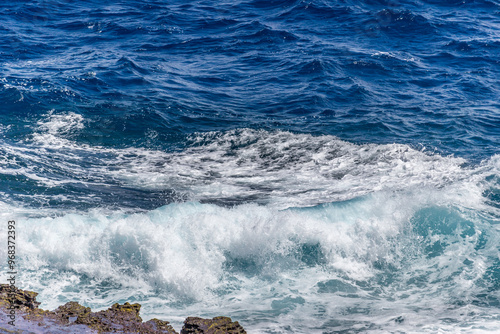 Fototapeta Naklejka Na Ścianę i Meble -  Dramatic Ocean crashing wave Hawaii at Makapu Point