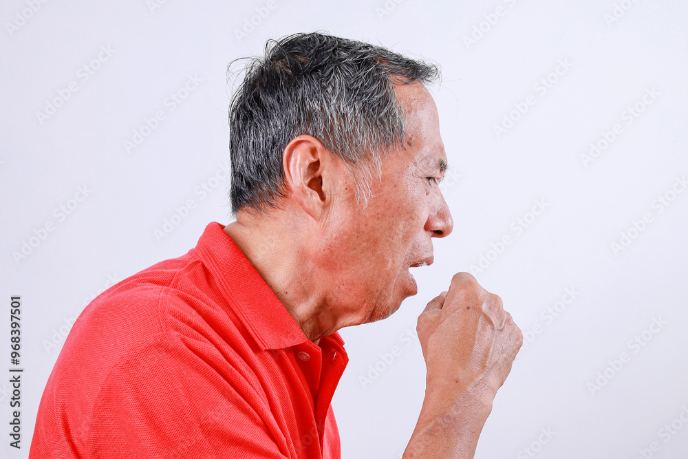 Asian senior man coughing isolated on white background Asian senior man coughing isolated on white background