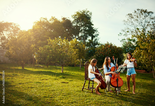 Outdoor, group and women with violin, music and creativity with classical music, instrument and nature. People, forest and friends with event for earth day, team and environment with support and joy