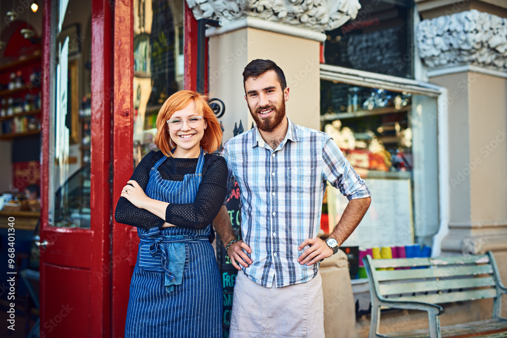 Portrait, man and woman at cafe door with confidence, smile and partnership for small business owner at restaurant. Entrepreneur, team and happy couple at coffee shop entrance with service in Ireland Portrait, man and woman at cafe door with confidence, smile and partnership for small business owner at restaurant. Entrepreneur, team and happy couple at coffee shop entrance with service in Ireland