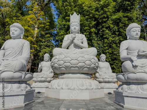 Seated group of Buddhist statues