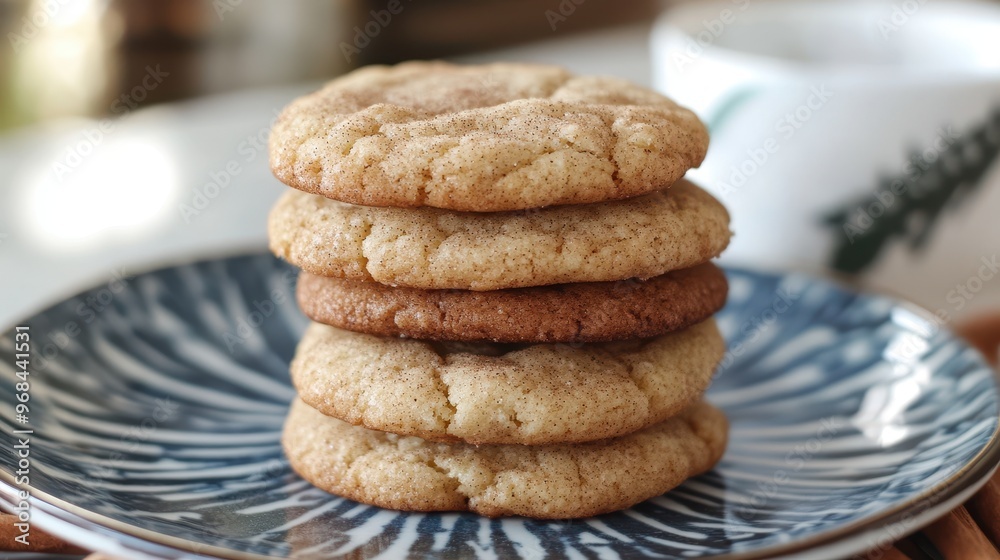 A stack of cinnamon cookies on a blue plate A stack of cinnamon cookies on a blue plate