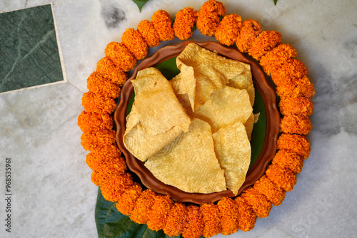 Fried Papad served in earthenware photo