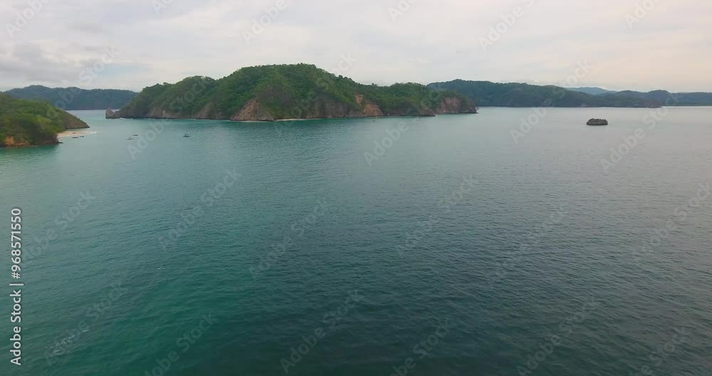Drone flying over calm deep blue ocean water off the coast of the tropical Tortuga Islands in Costa Rica Drone flying over calm deep blue ocean water off the coast of the tropical Tortuga Islands in Costa Rica