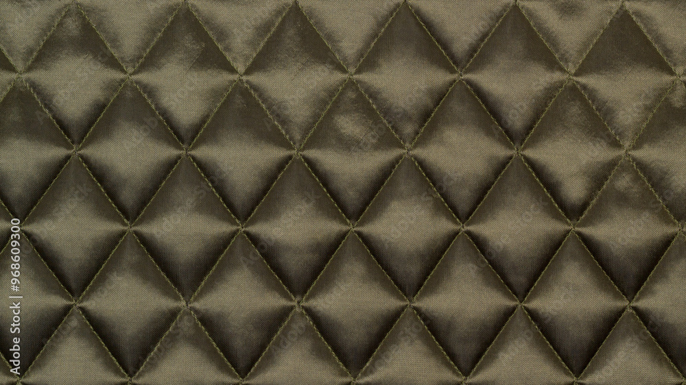 Quilted fabric. The texture of the blanket. Quilted fabric. The texture of the blanket.
