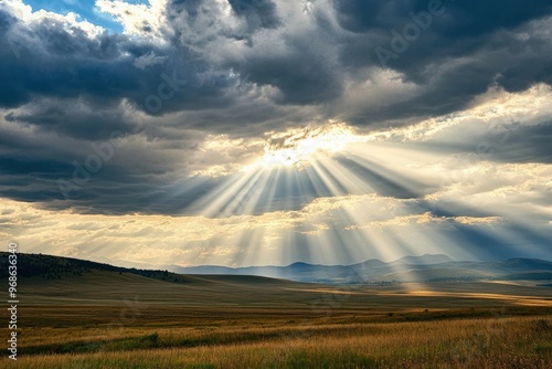 Cloudy Sky with Sunbeams Breaking Through: An awe-inspiring scene where the sun breaks through thick clouds