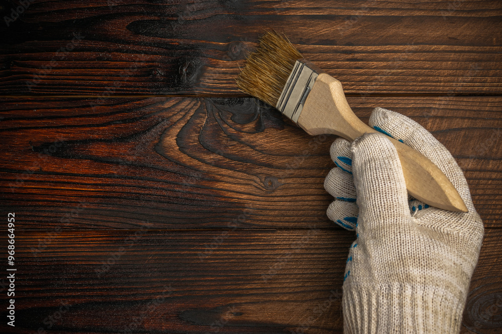 Hand Painting Wood Plank with Brush in Glove - DIY Home Improvement and Artistic Craftsmanship Hand Painting Wood Plank with Brush in Glove - DIY Home Improvement and Artistic Craftsmanship