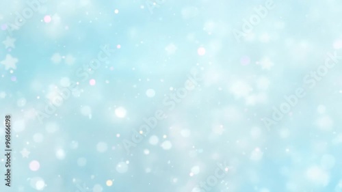 Blurred white star shapes on light blue background. Abstract bokeh effect. 4K background material for loop playback