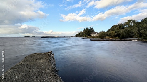 Obraz na płótnie Beautiful lakeside landscape scenery, house by the lake near Oughterard pier on Corrib lake, Galway, Ireland, nature background w salonie