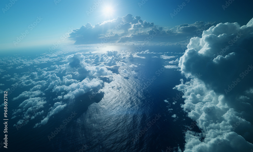 Naklejka premium Majestic clouds and ocean scenery with sunlight reflecting off them 雲と太陽光が反射する海の風景