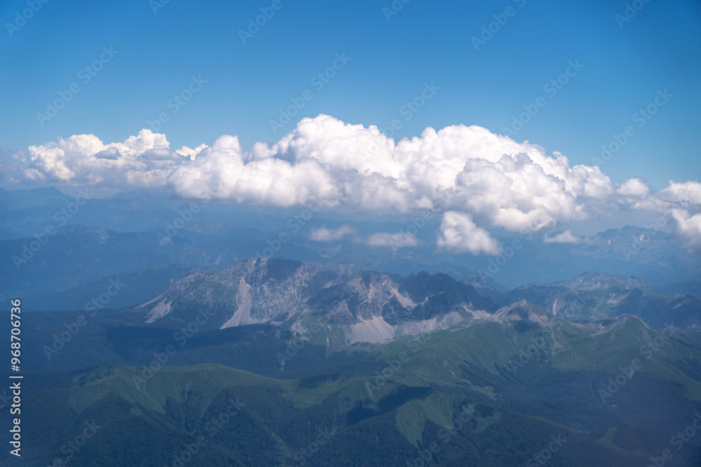 Fototapeta premium Blue Sky with White Clouds, Flying above Sunny Cloudy Sky Texture Pattern, Fluffy Clouds Plane View