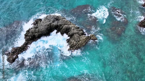Resilient Coastline: Rocks Against Ocean Waves