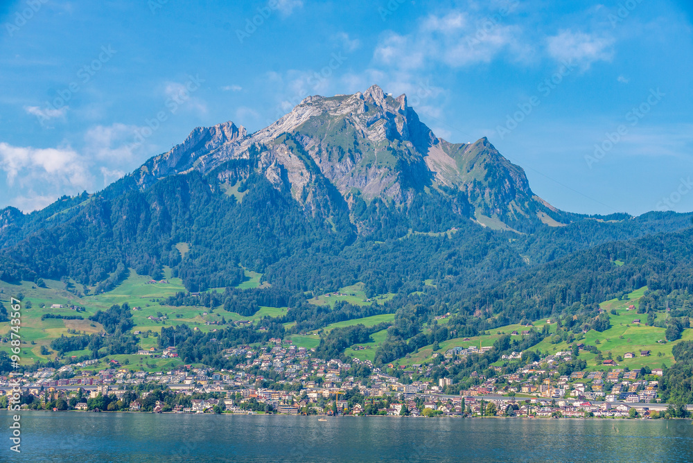 Panoramic view of the Mount Pilatus and Coast of Lake Lucerne and Swiss villages, Lucerne, Switzerland, 19 Aug 2022 Panoramic view of the Mount Pilatus and Coast of Lake Lucerne and Swiss villages, Lucerne, Switzerland, 19 Aug 2022