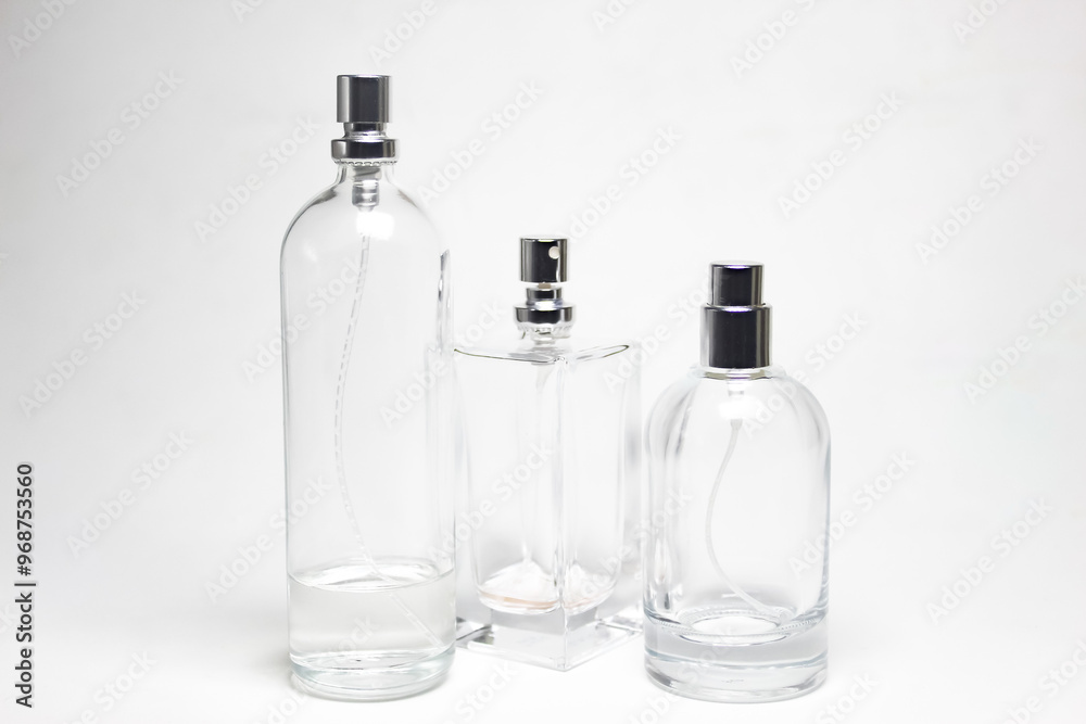 several glass perfume bottles isolated on a white background several glass perfume bottles isolated on a white background