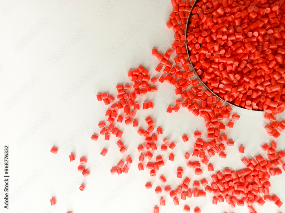 Red masterbatch granule, red pigment, red polymer granules, cold cutting type granule texture, isolated on white background, for industrial plastic company profile product catalog design