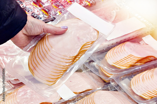 Handwith ham at food store photo