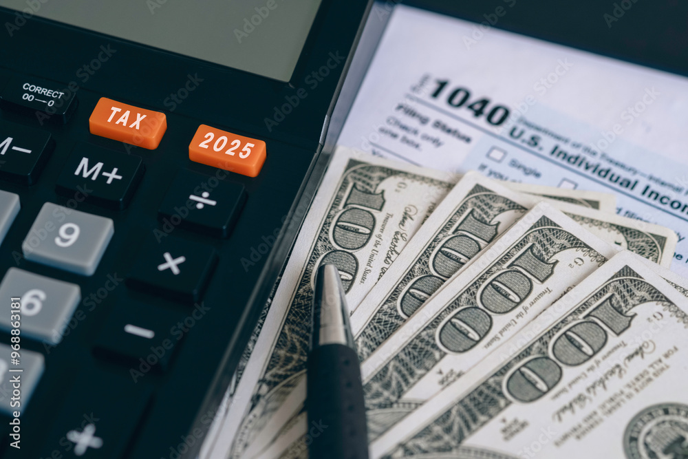 Word Tax 2025 on the calculator on documents.Income Statement. paying the tax rate. Taxation, taxes burden.Business and tax concept. Form 1040, U.S. Individual Income Tax Return.
Word Tax 2025 on the calculator on documents.Income Statement. paying the tax rate. Taxation, taxes burden.Business and tax concept. Form 1040, U.S. Individual Income Tax Return.