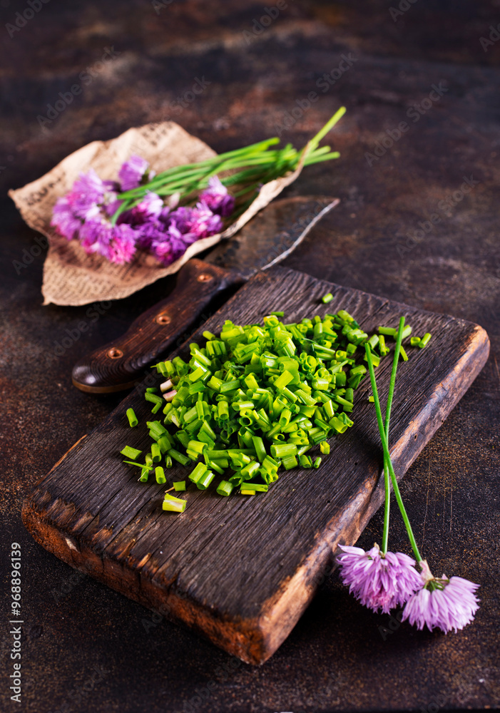 Purple onion flower and fresh green onion Purple onion flower and fresh green onion