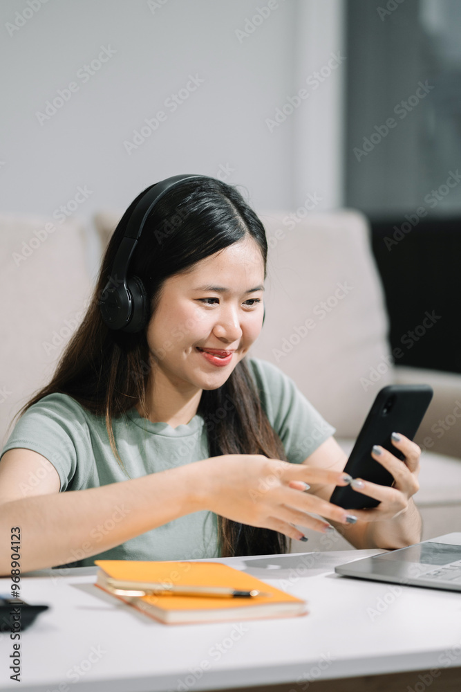 woman uses mobile phone to chat with friends during her free time. woman uses mobile phone to chat with friends during her free time.