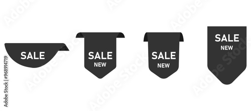 A collection of four striking black labels, each prominently featuring the word sale printed on them for easy identification and promotion