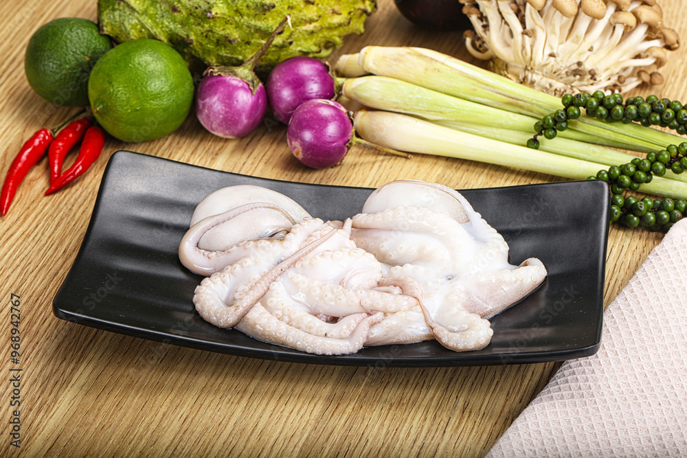 Delicous fresh raw uncooked octopus Delicous fresh raw uncooked octopus