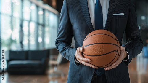 Businessman Holding a Basketball.