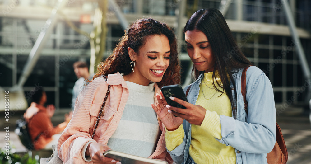 Obraz premium Students, women and discussion with phone at school for campus gossip, social media and reading blog. Friends, people and mobile for education news, article information and university notification