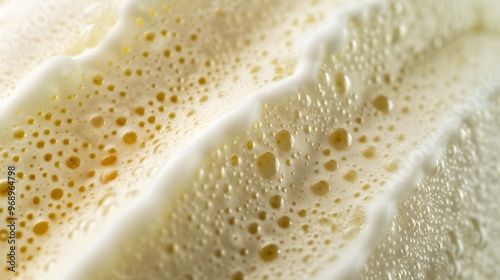 Whipped cream texture backdrop. White ice cream closeup with tiny bubbles in texture