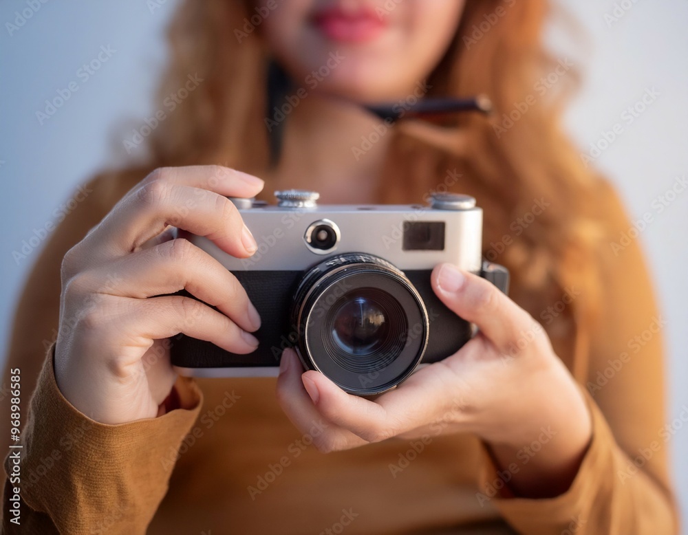 Person using a camera to capture a special moment, illustrating memories, photography, and experience. Person using a camera to capture a special moment, illustrating memories, photography, and experience.