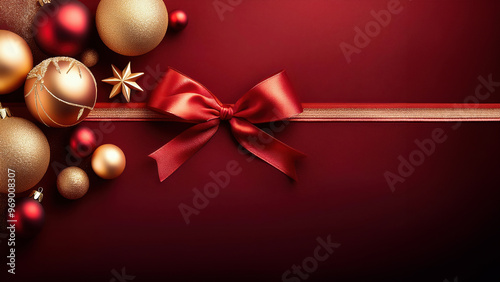 Elegant Christmas background decorate with spruce pine tree branches, bow and other Christmas ornament in red background.