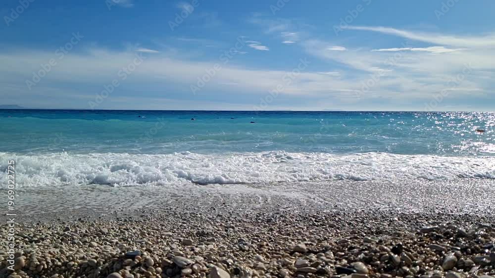 Sea Wave Splashing The beautiful waters of the sea, in slow motion, break against the pebble beach in Borsh, Albania, Sea Wave Splashing The beautiful waters of the sea, in slow motion, break against the pebble beach in Borsh, Albania,