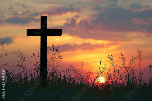 concept conceptual black cross religion symbol silhouette in grass over sunset or sunrise sky,