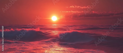 A red sunset above the ocea...