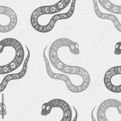 Seamless vector pattern decorated snake with Ukrainian embroidery, the animal symbol of 2025. Simple doodle style. Grid