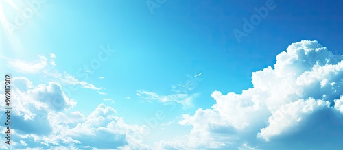Blue sky featuring white cl...