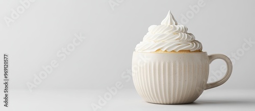 Mug and meringue cake on a ...
