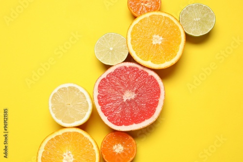 Tropical fruits on a colored background. Summer concept. Flat lay, top view, copy space