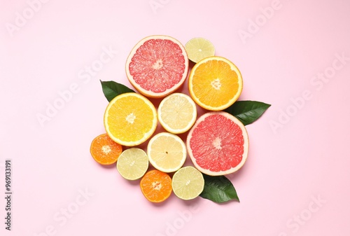 Tropical fruits on a colored background. Summer concept. Flat lay, top view, copy space