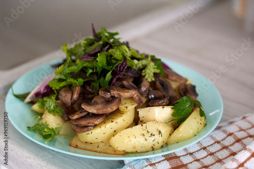 A close-up of a freshly prepared dish featuring sauteed mushrooms, roasted potatoes, and fresh herbs like parsley and basil, garnished with leafy greens