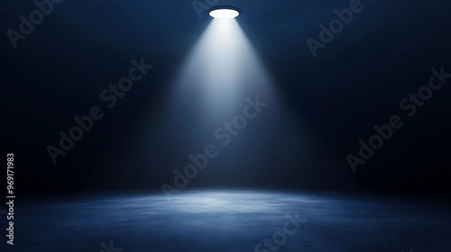 Deep indigo background with a single spotlight casting a cool white light from above at a narrow angle, leaving space for your message or branding.