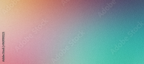 Abstract grainy texture background fading from orange to blue and green