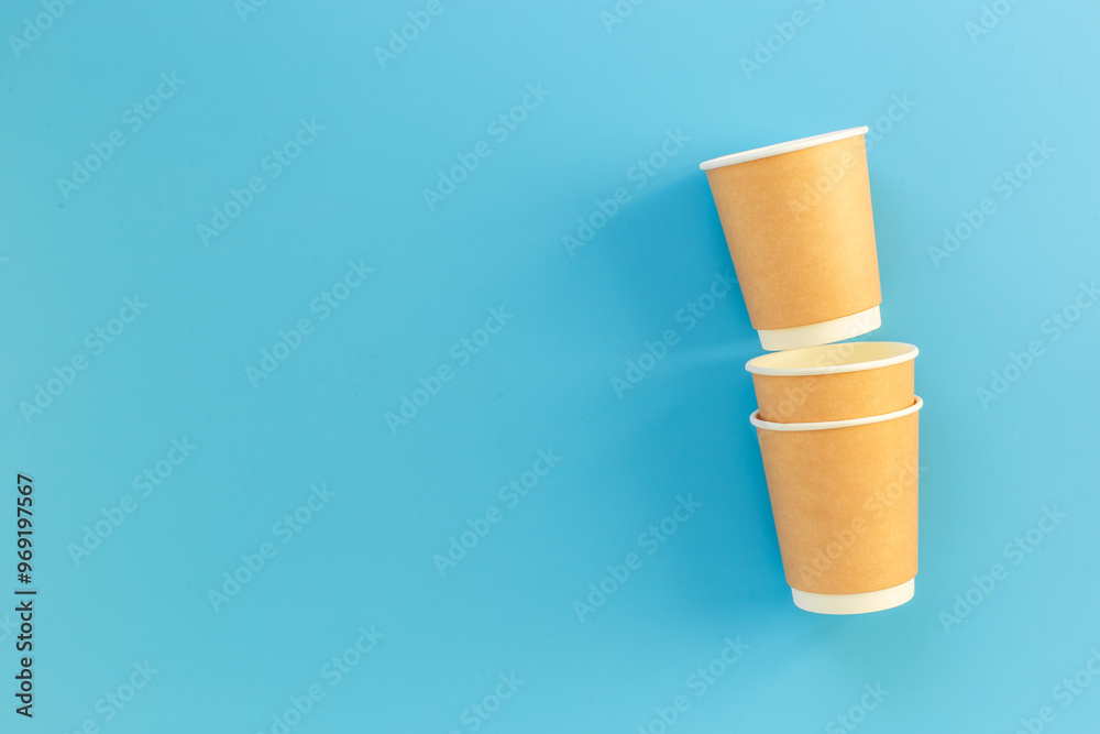 Stack of recyclable coffee paper cups, top view. Eco-friendly zero waste products Stack of recyclable coffee paper cups, top view. Eco-friendly zero waste products