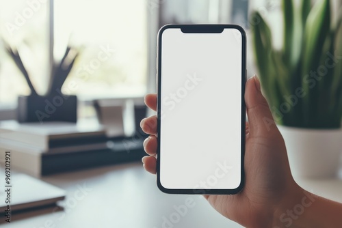 cell phone blank white screen mockup.hand holding texting using mobile on desk at office.background empty space for advertise.work people contact marketing business,technology with generative ai