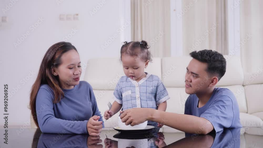 Family enjoying a joyful meal together at home in the afternoon