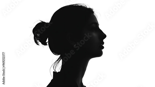 a person against a light gray studio background, silhouette