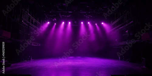 Empty Theater Stage Illuminated by Dramatic Purple Lighting photo