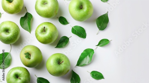 Wallpaper Mural Fresh green apples with leaves on white background Torontodigital.ca