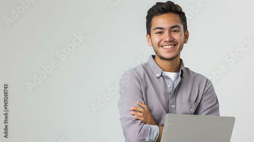Young Man Using Laptop, Smiling at Camera, White Background, Technology,