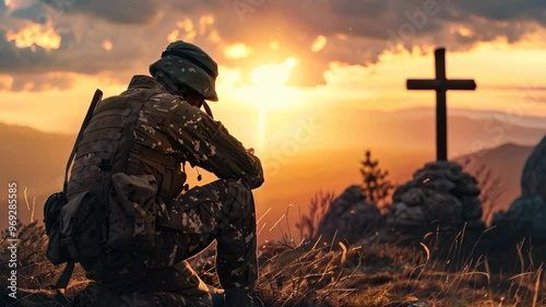 A soldier kneeling before a cross at sunset, reflecting or praying in a tranquil natural setting.